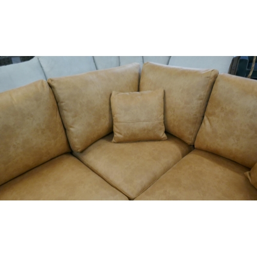 3002 - A tan suede effect corner sofa