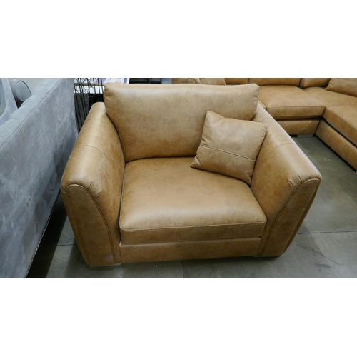 3003 - A tan suede effect love seat