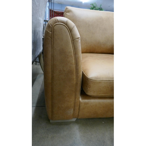 3003 - A tan suede effect love seat