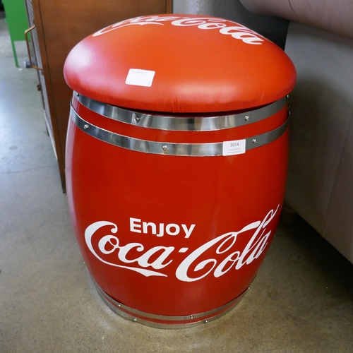 3014 - An upholstered Coca Cola storage barrel