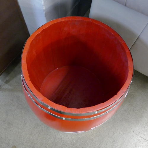 3014 - An upholstered Coca Cola storage barrel