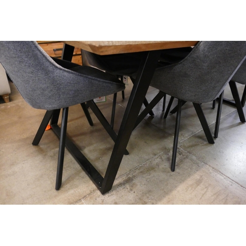 3031 - An Iconic dining table and six grey upholstered chairs  * This lot is subject to VAT