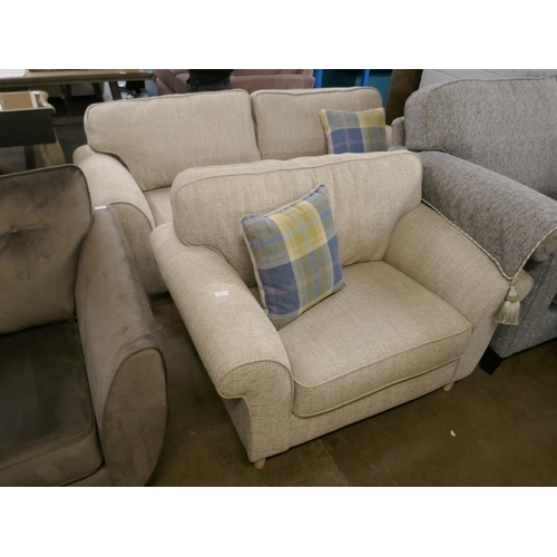 3054 - An oatmeal compact three seater sofa and armchair