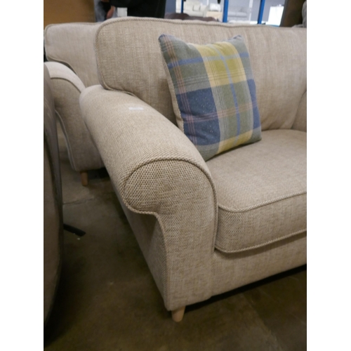 3054 - An oatmeal compact three seater sofa and armchair