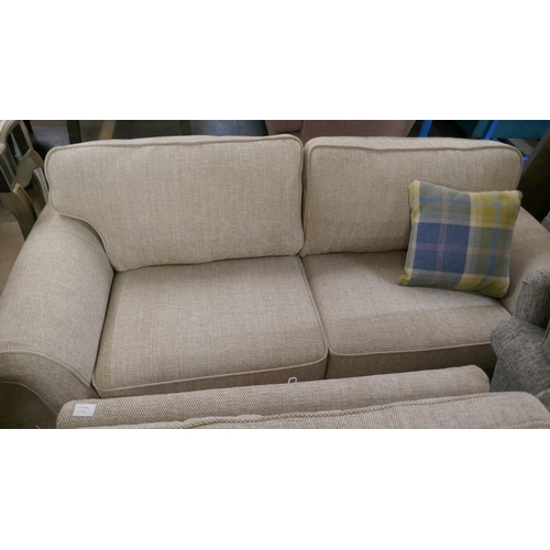 3054 - An oatmeal compact three seater sofa and armchair