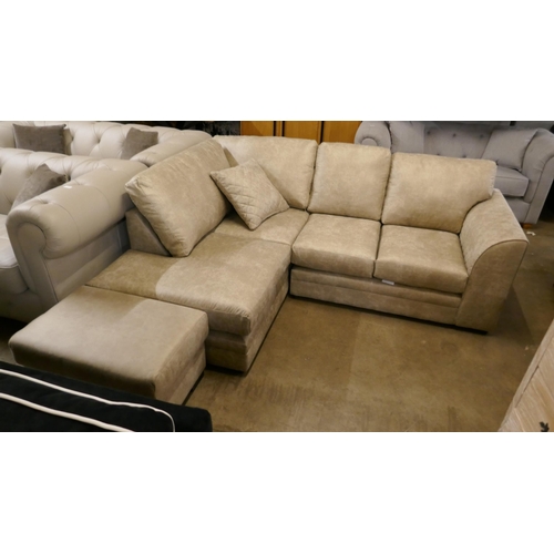 3055 - A stone suede effect corner sofa and footstool - minor frame damage