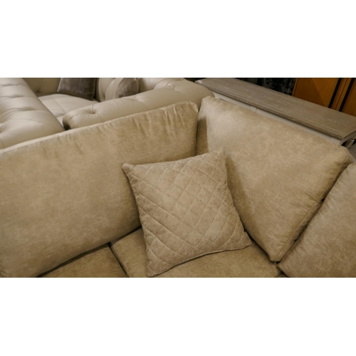 3055 - A stone suede effect corner sofa and footstool - minor frame damage