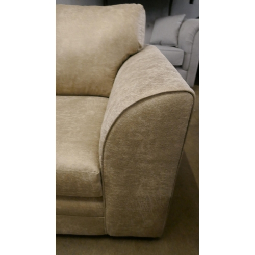 3055 - A stone suede effect corner sofa and footstool - minor frame damage