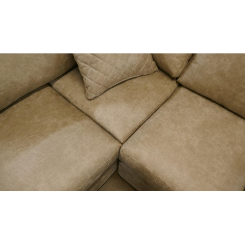 3055 - A stone suede effect corner sofa and footstool - minor frame damage