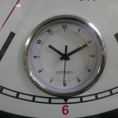 3060 - A black multi dial clock