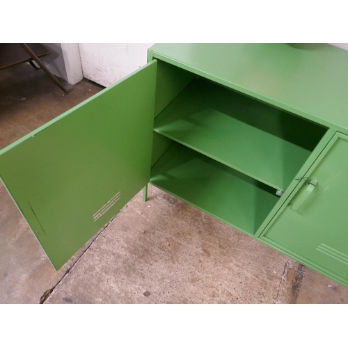 3065 - A large green industrial style cabinet