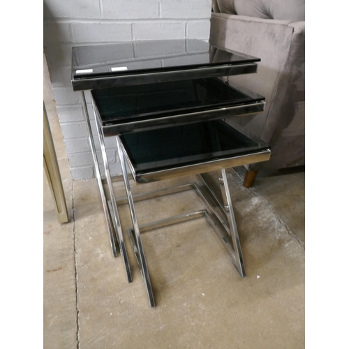 3068A - Glass and chrome nest of three tables *This lot is subject to VAT