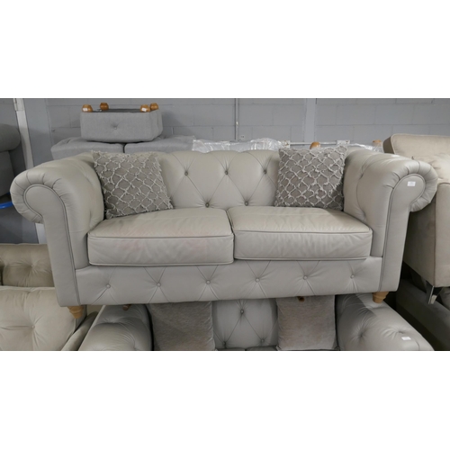 3093 - A stone leather Chesterfield three seater sofa RRP £1499