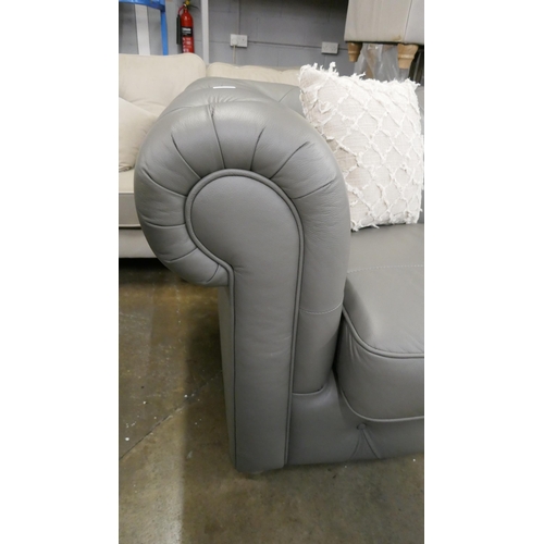 3097 - A grey leather Chesterfield three seater sofa