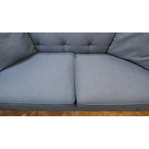 3100 - A blue upholstered Chesterfield three seater sofa-bed