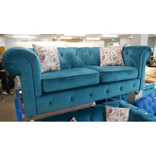 3105 - A turquoise velvet Chesterfield three seater sofa