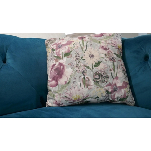 3105 - A turquoise velvet Chesterfield three seater sofa