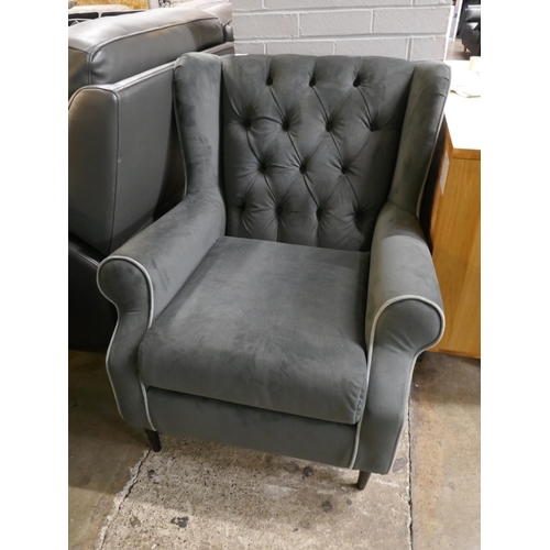 3113 - A grey velvet wingback armchair