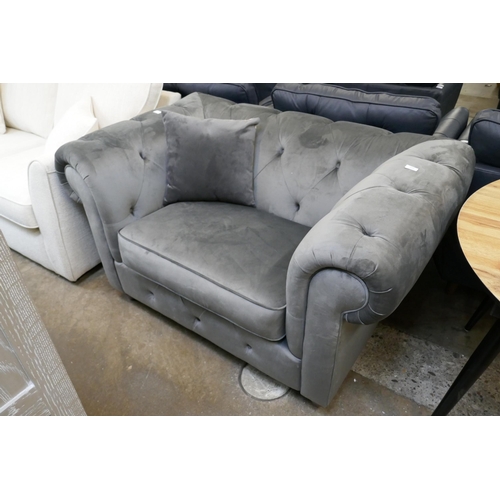 3143 - A grey velvet Chesterfield love seat