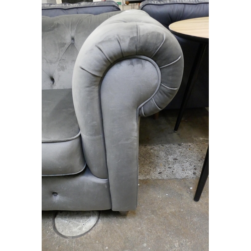 3143 - A grey velvet Chesterfield love seat