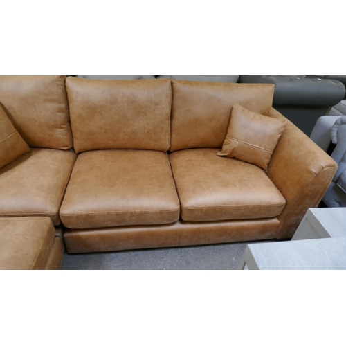 3149 - A large tan suede effect corner sofa