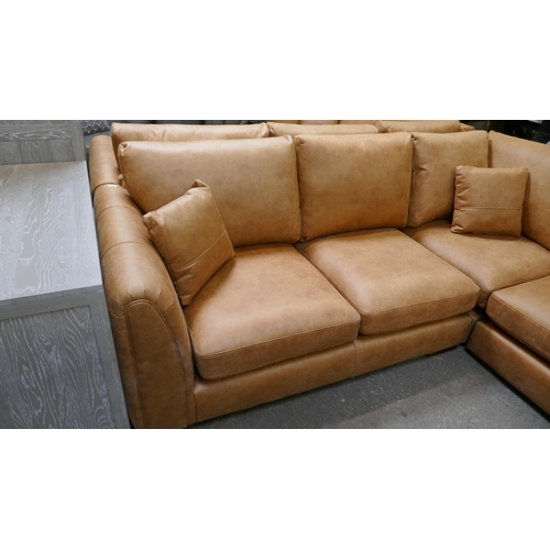 3149 - A large tan suede effect corner sofa