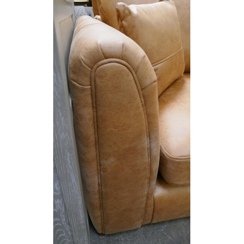 3149 - A large tan suede effect corner sofa