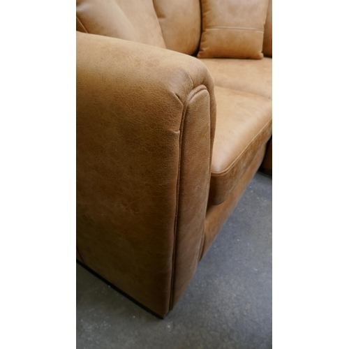 3149 - A large tan suede effect corner sofa