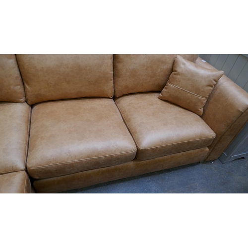 3149 - A large tan suede effect corner sofa