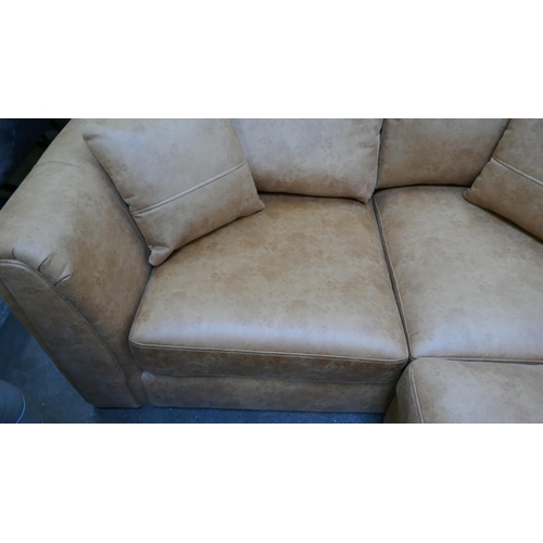 3149 - A large tan suede effect corner sofa