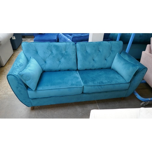 3150 - A turquoise velvet Hoxton three seater sofa