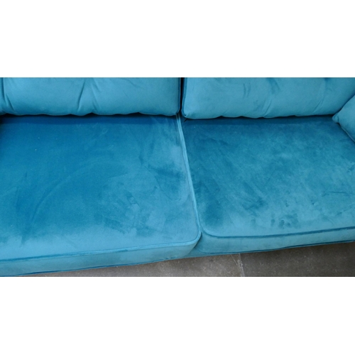 3150 - A turquoise velvet Hoxton three seater sofa