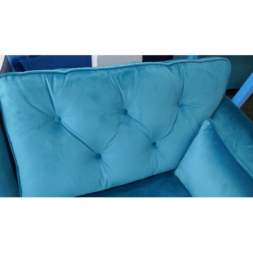 3150 - A turquoise velvet Hoxton three seater sofa