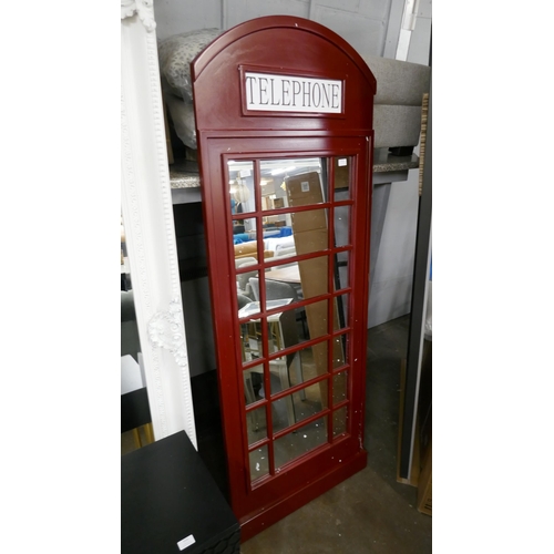 3160 - A large mirror in the form of a telephone box