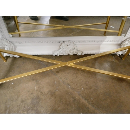 3162 - A black console table with gold legs