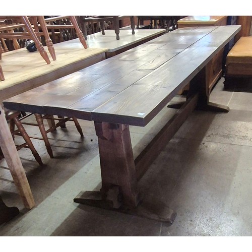 92 - An early 20th Century and later oak and pine refectory table