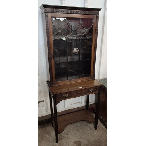 96 - An Edward VII Chippendale Revival carved mahogany cabinet on stand