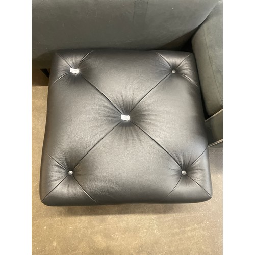 3069 - A black leather Chesterfield footstool