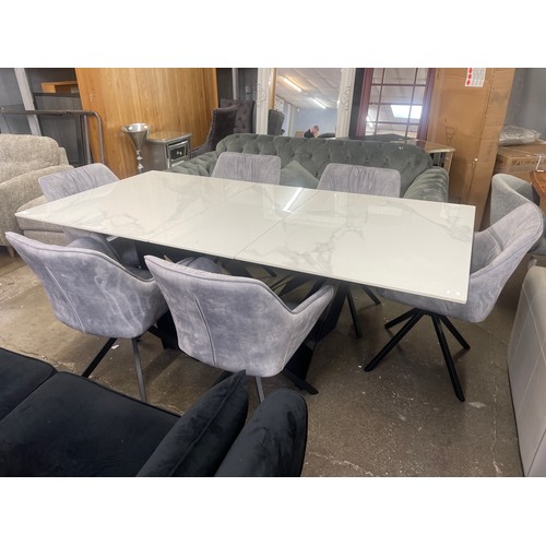 3155 - Marvel extending dining table and six silver velvet chairs *This lot is subject to VAT