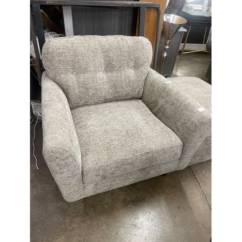 3167 - A grey weave upholstered armchair and footstool, ex display