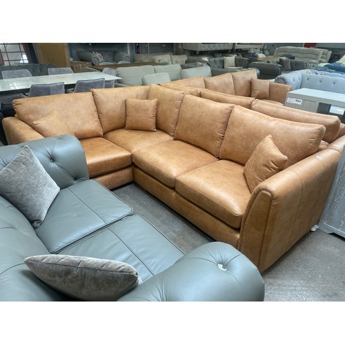 3174 - A tan suede effect corner sofa