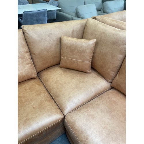 3174 - A tan suede effect corner sofa