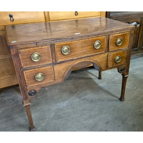 88 - A George IV mahogany five drawer side table