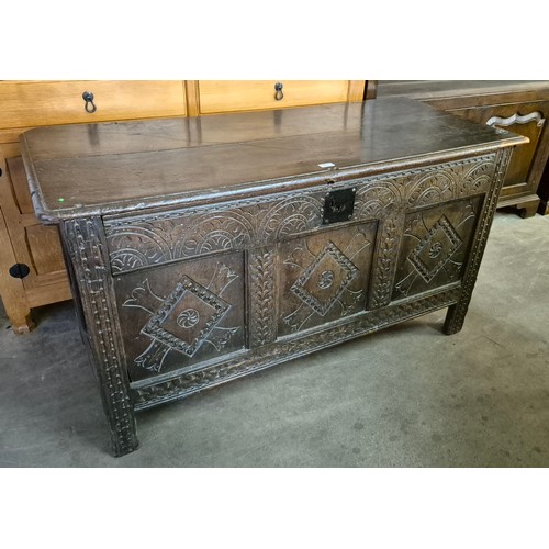 89 - A Charles II carved oak coffer