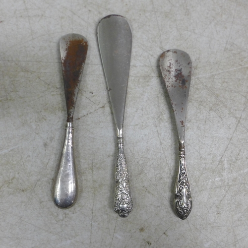 5080 - Three silver handled shoe horns