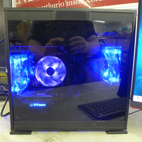 5094 - A gaming computer set up comprising of an Erazer X10 MD34430 tower PC CPU: an air-cooled intel I7-12... 