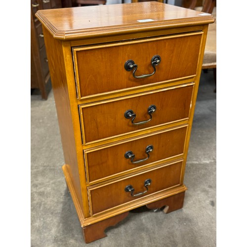 184 - A yew wood chest of drawers