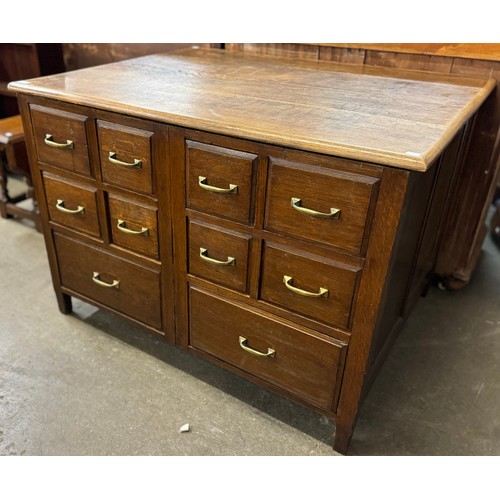 185 - A Victorian style oak chest of drawers