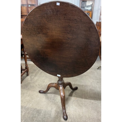 186 - A George III mahogany tilt top tripod tea table