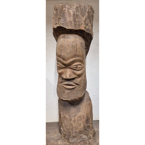 317 - An African carved hardwood bust of a man